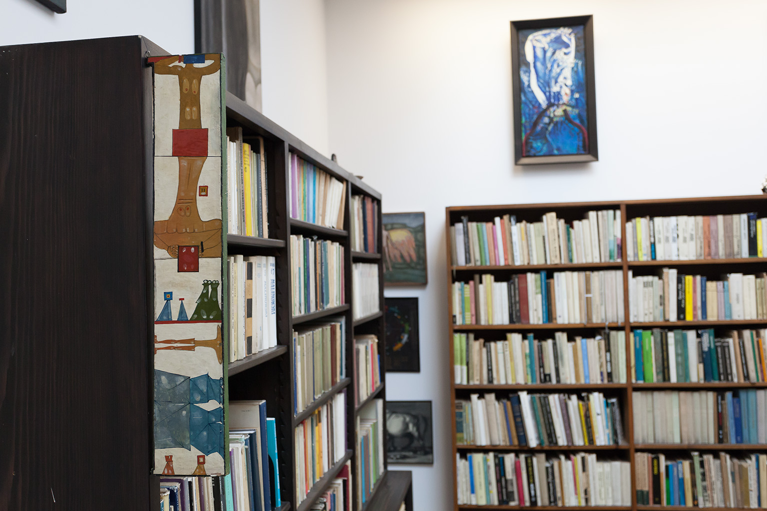  Mieczyslaw Porebski's Library, in the photograph visible a framgement of Jerzy Nowosielski's work //Study with Variantions//, 1960, oil / wood,  60 × 11 cm, photo: Rafal Sosin