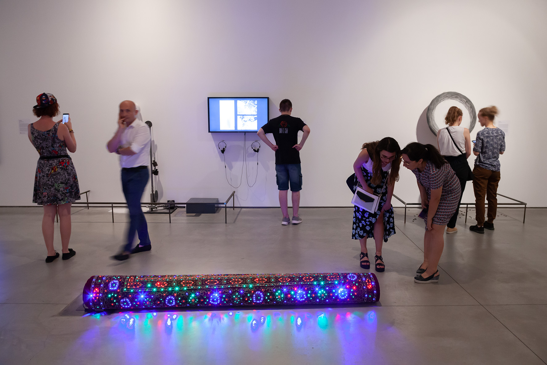 //Motion as the Stuff of Art// (MOCAK Collection) exhibition. Foreground: Marek Kvetán, //Carpet//, 2008, object, 235 × ø 23 cm, MOCAK Collection. Background works by: Evelyn Loschy, Walid Siti. Photo: R. Sosin