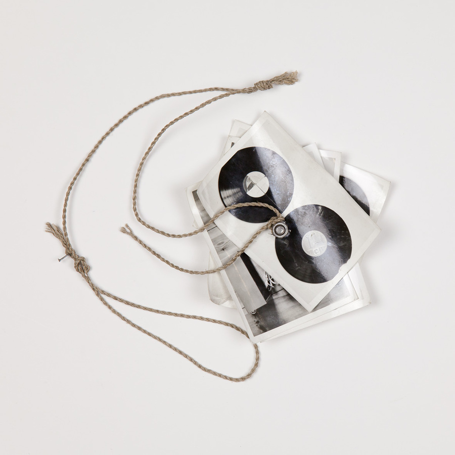 Milan Knížák, //Fly//, 1987, photograph, screw, string, 13.5 × 13.5 cm, MOCAK Collection